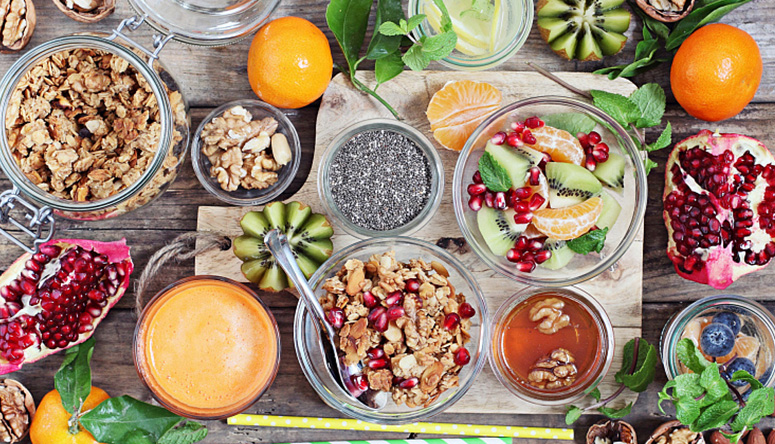 Fresh seasonal vegetables and cooling herbs representing an Ayurvedic Pitta-balancing diet for summer wellness