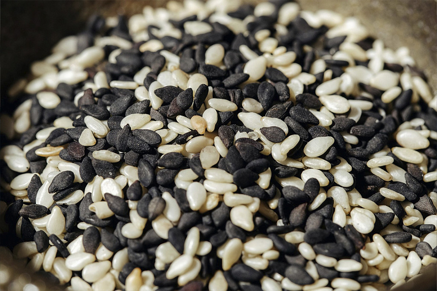 Macro photograph of black and white sesame seeds used for ayurvedic iron remedies